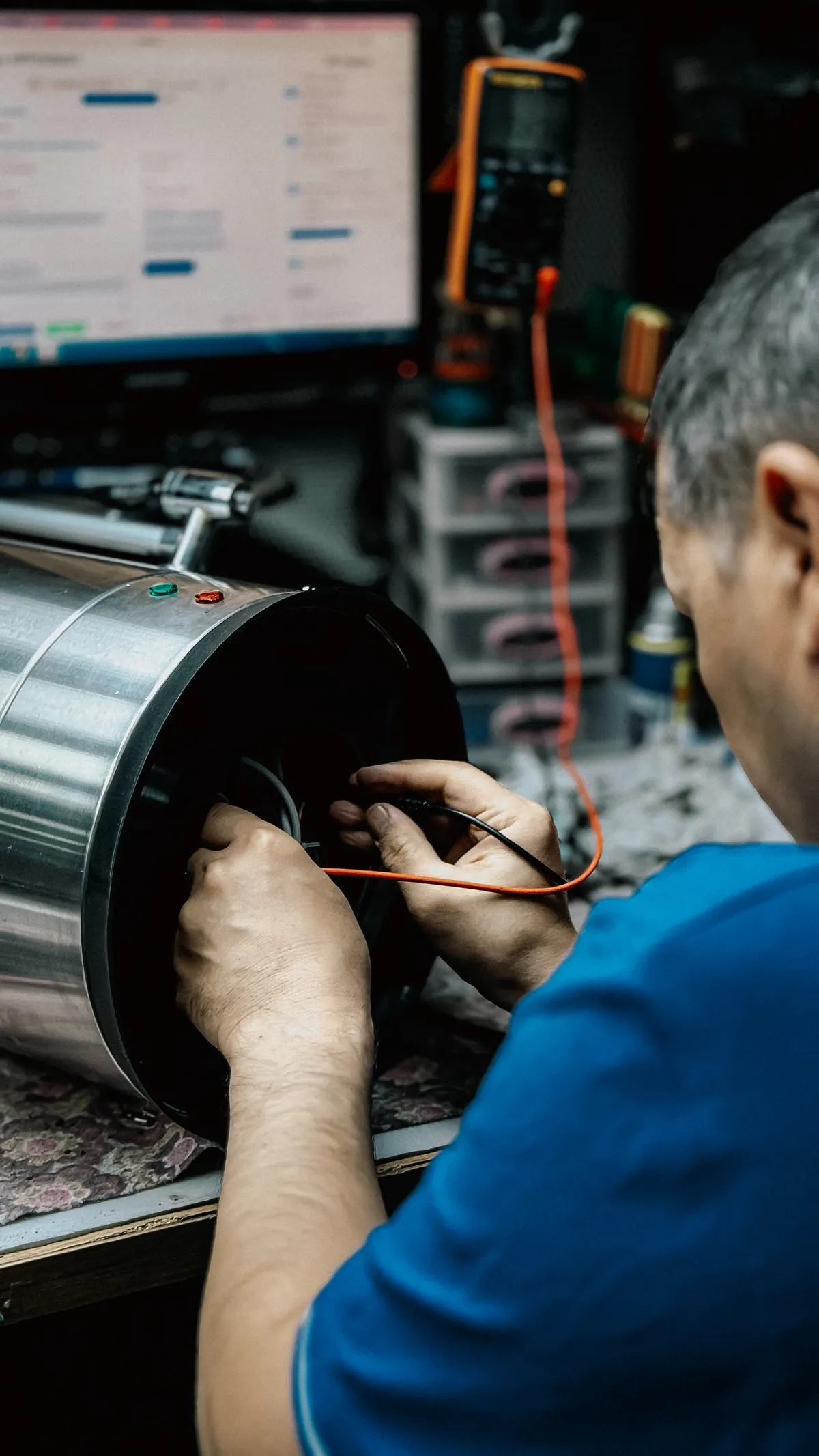 Technician repairing a heating boiler